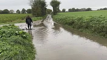 play Muddy fields, rainsuit in the rain (wam, wet and messy)